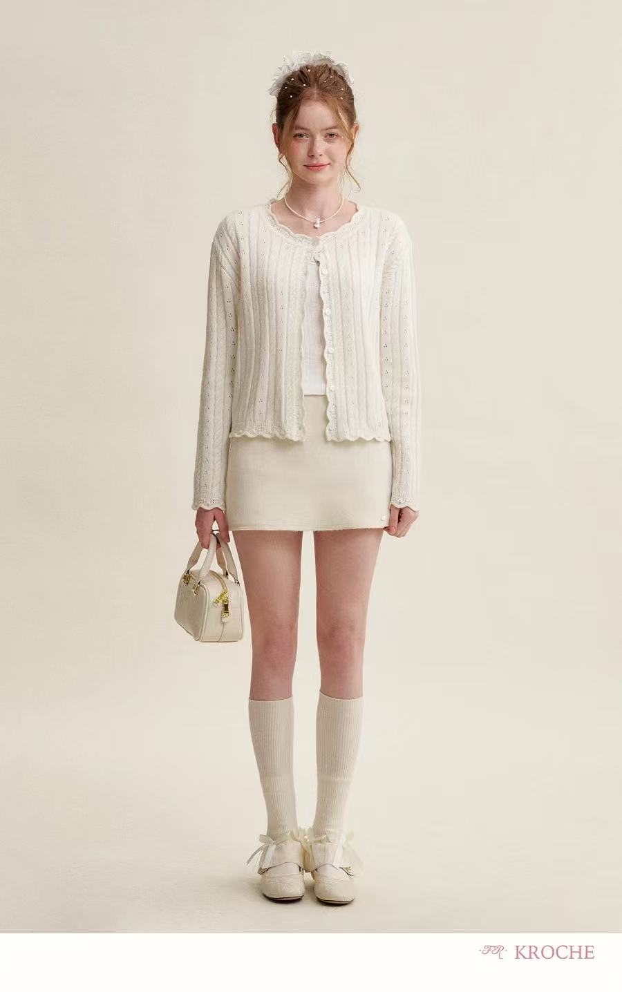 Kroche Hollow out knit cardigan