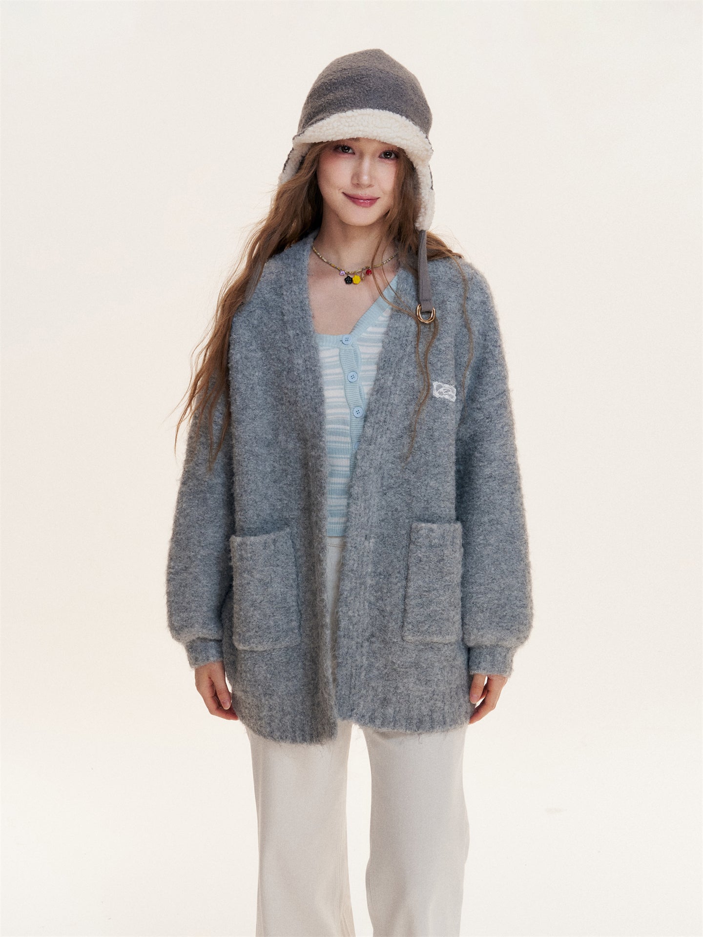 16DEWS 16D25421 Slanted shoulder design striped long sleeved knitted sweater