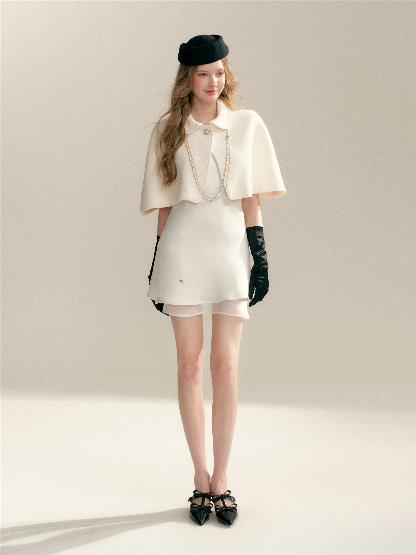 16DEWS 16D246055 Floral sleeveless cloak shawl