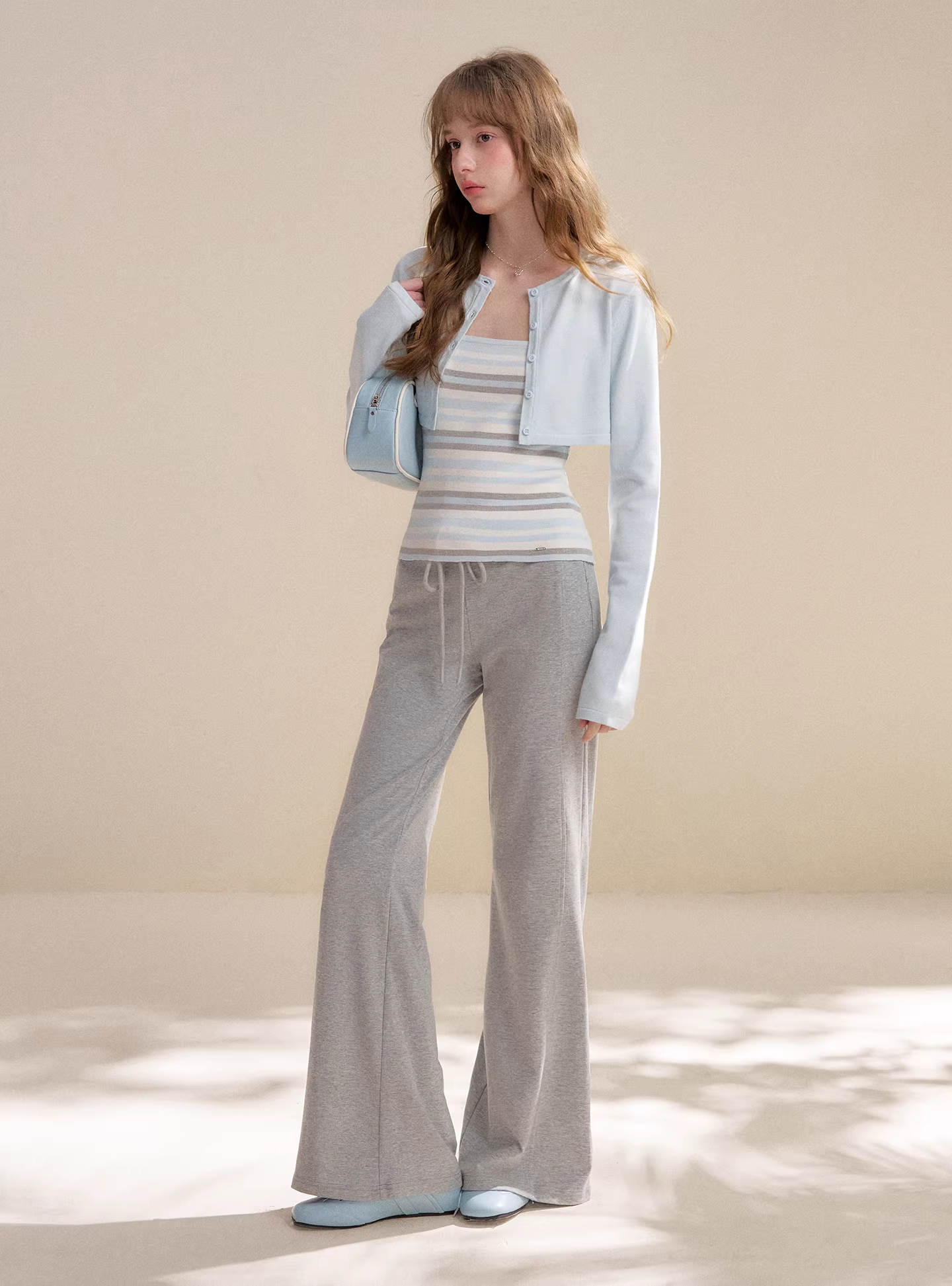 Kroche KZY2064 Long sleeved knitted cardigan + striped camisole