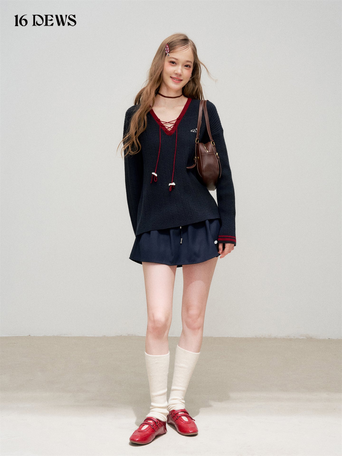 16DEWS 16D25304 Color blocking V-shaped tied flower knitted top
