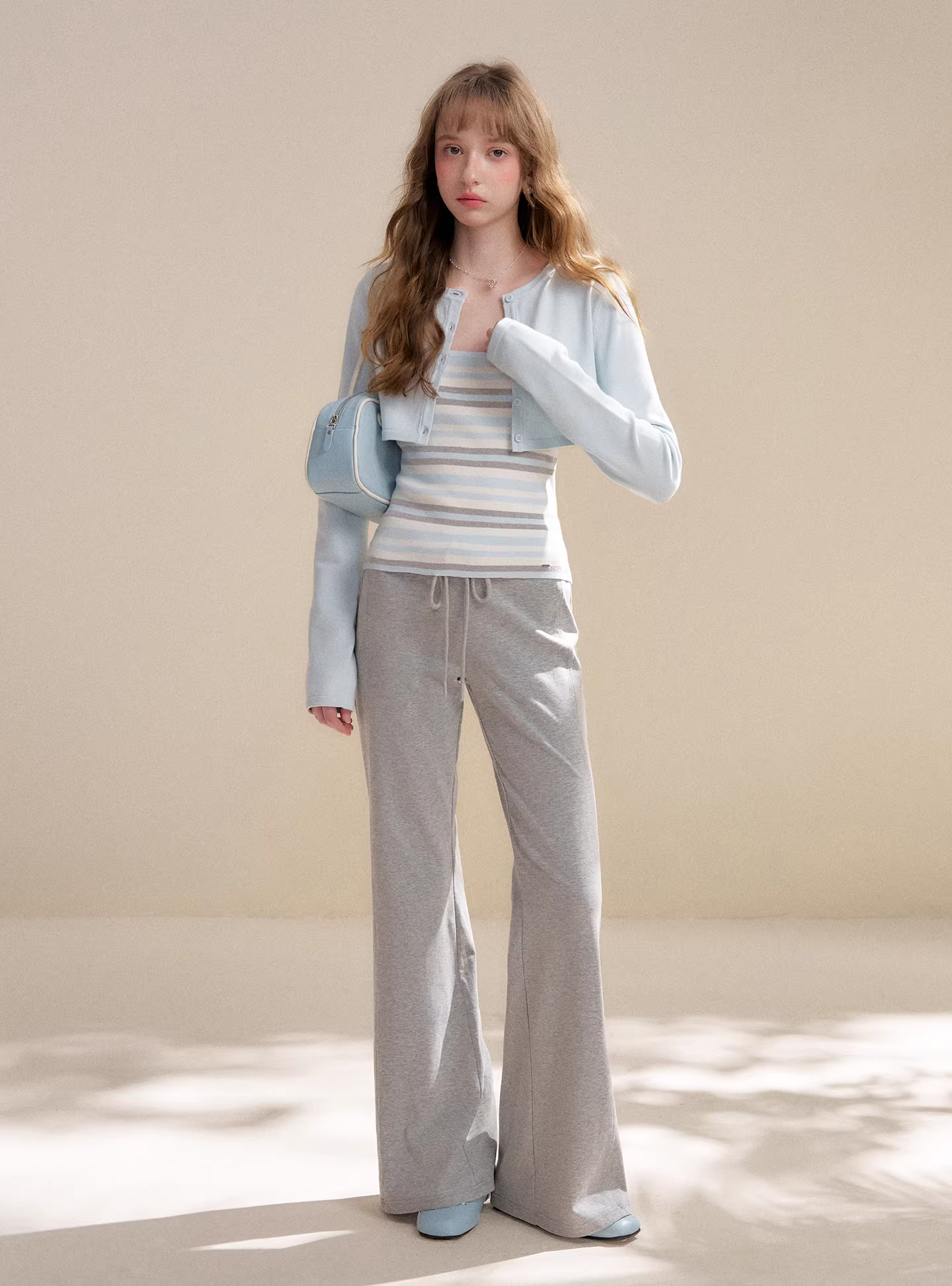 Kroche KZY2064 Long sleeved knitted cardigan + striped camisole