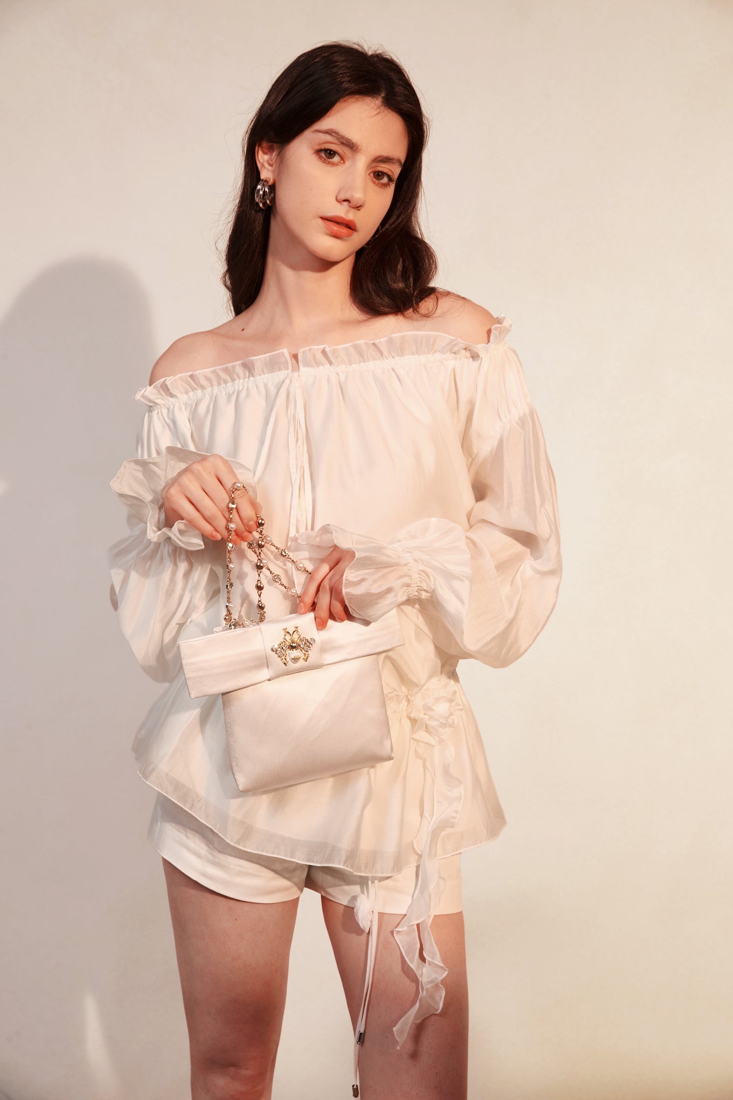 Kingwen White off shoulder shirt  + lace up shorts set (seperate)