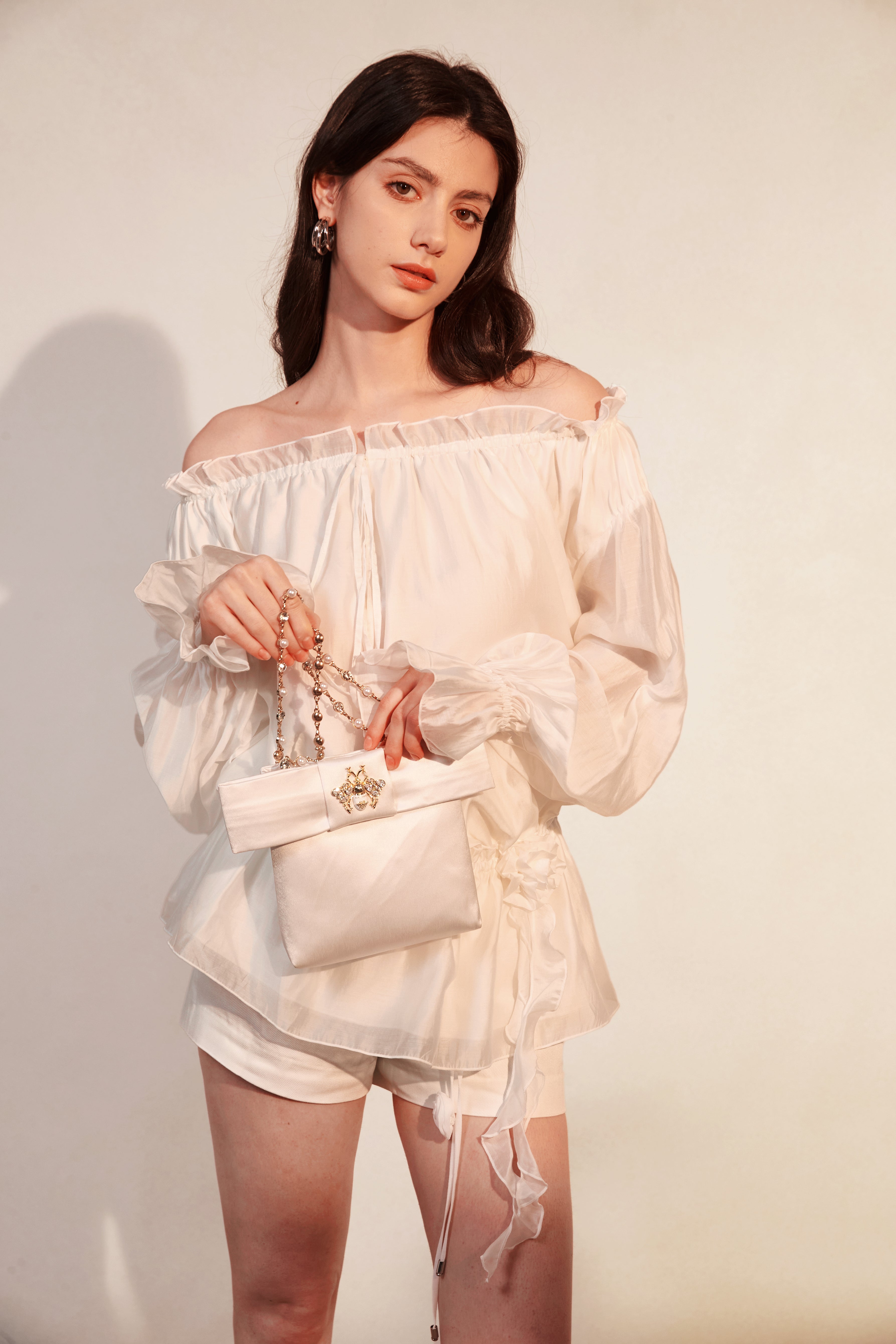Kingwen White off shoulder shirt + lace up shorts set (seperate)