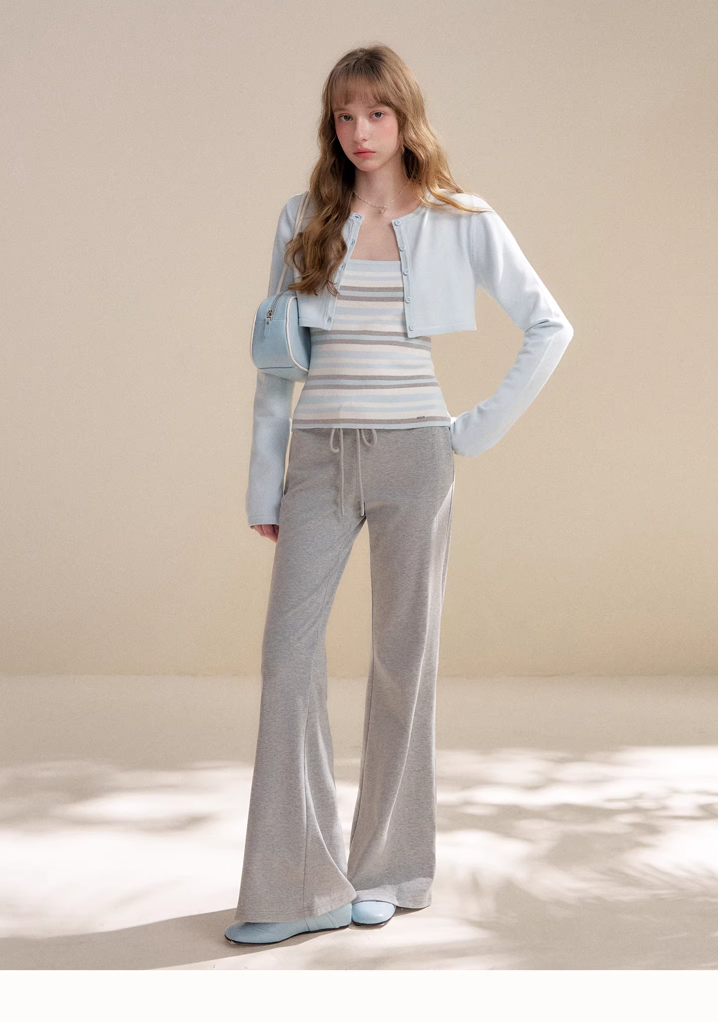 Kroche KZY2064 Long sleeved knitted cardigan + striped camisole