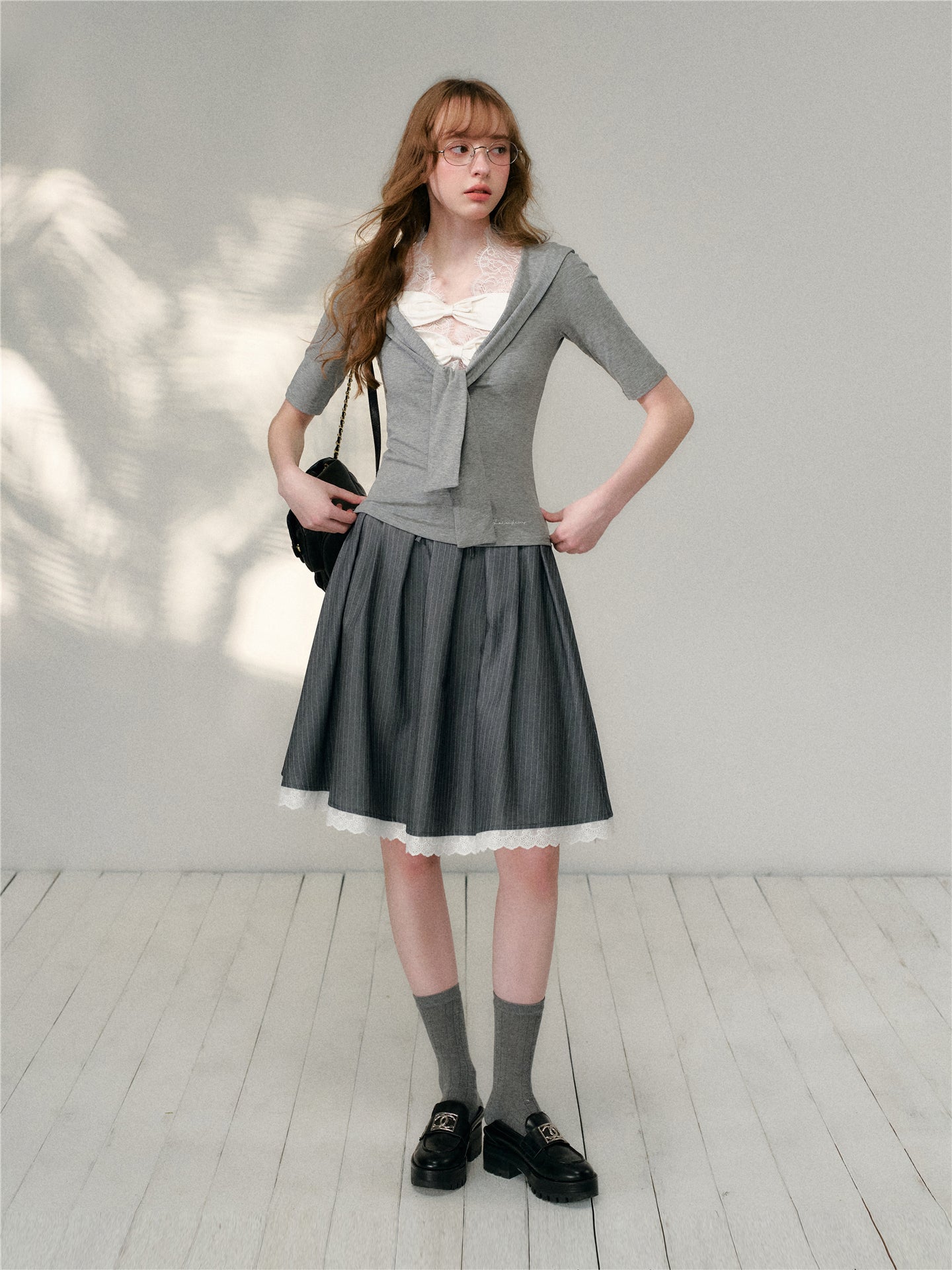 16DEWS 16D26122 Bow stitch mid sleeve top