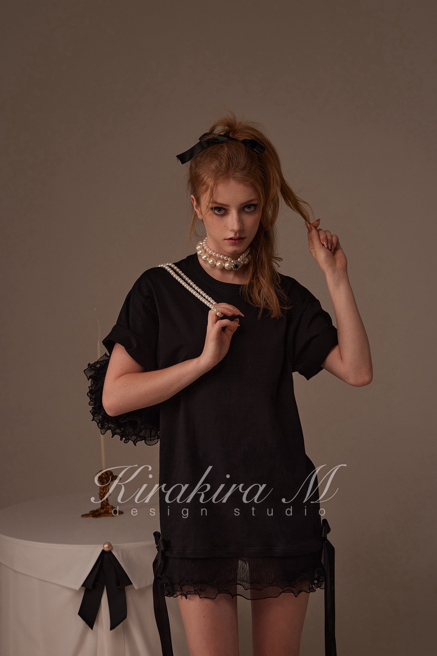 Kirakira.M Black bow loose T-shirt (Multiple ways to wear)