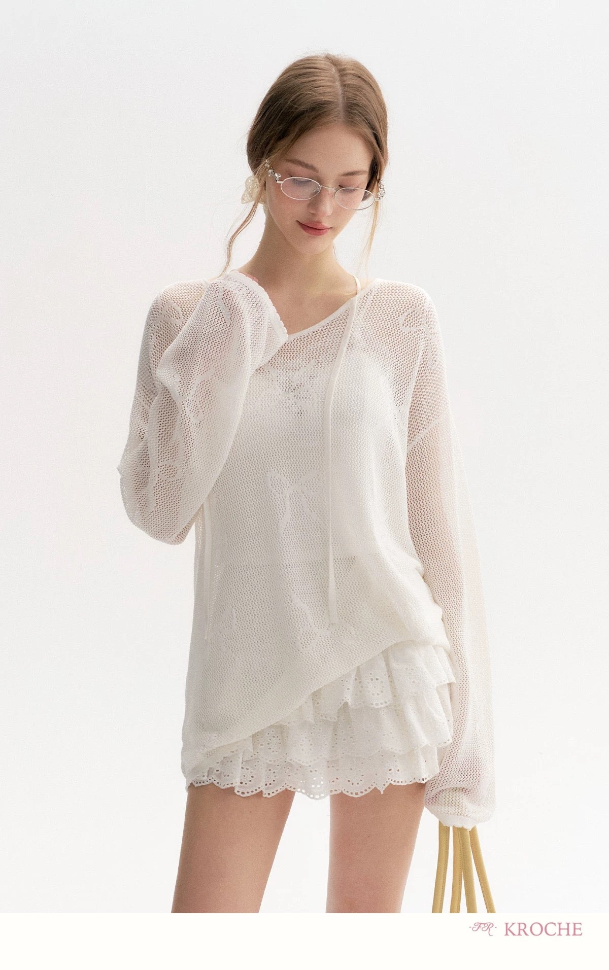 Kroche Loose lace up long sleeved knitted top