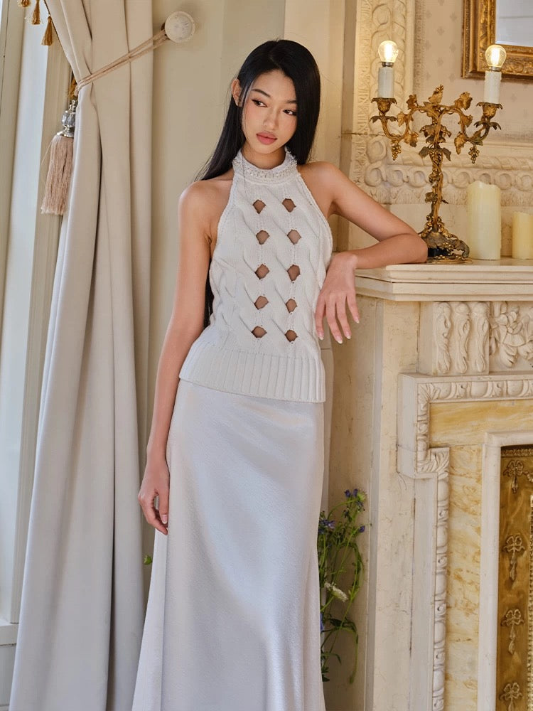 FIND YA WINGS Waist-cinching halter neck hollow knitted top