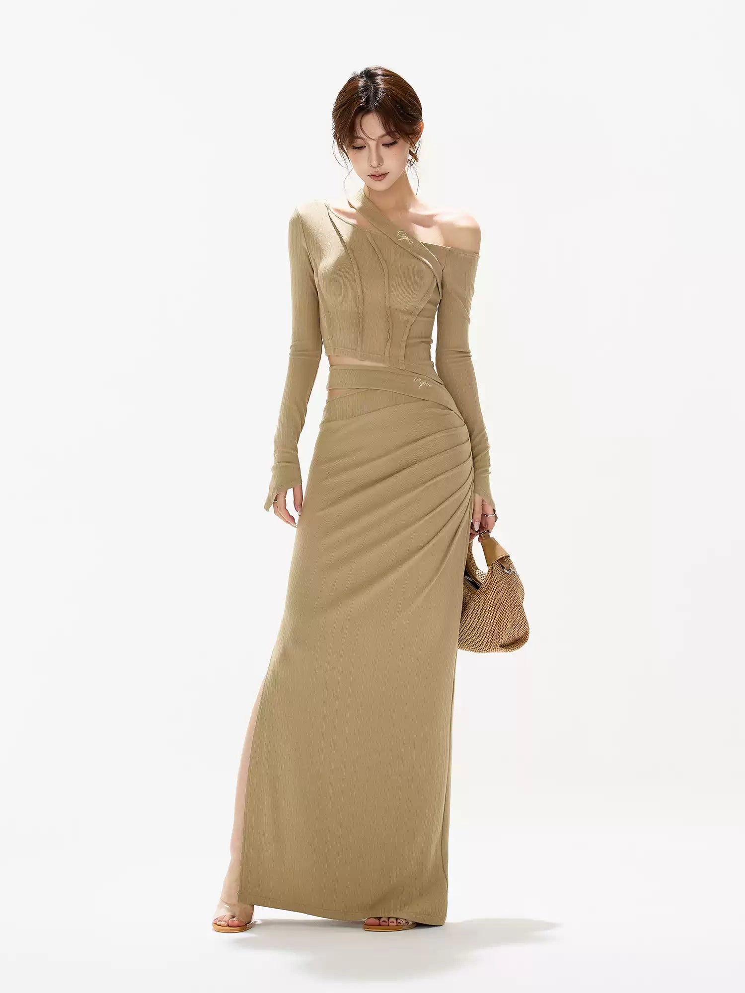 CYNR Slanted shoulder slim fit top + hollowed out long skirt