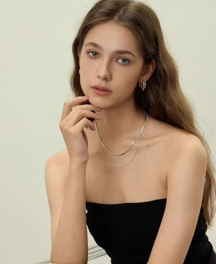 ARSIS Snake bone double-layer earrings