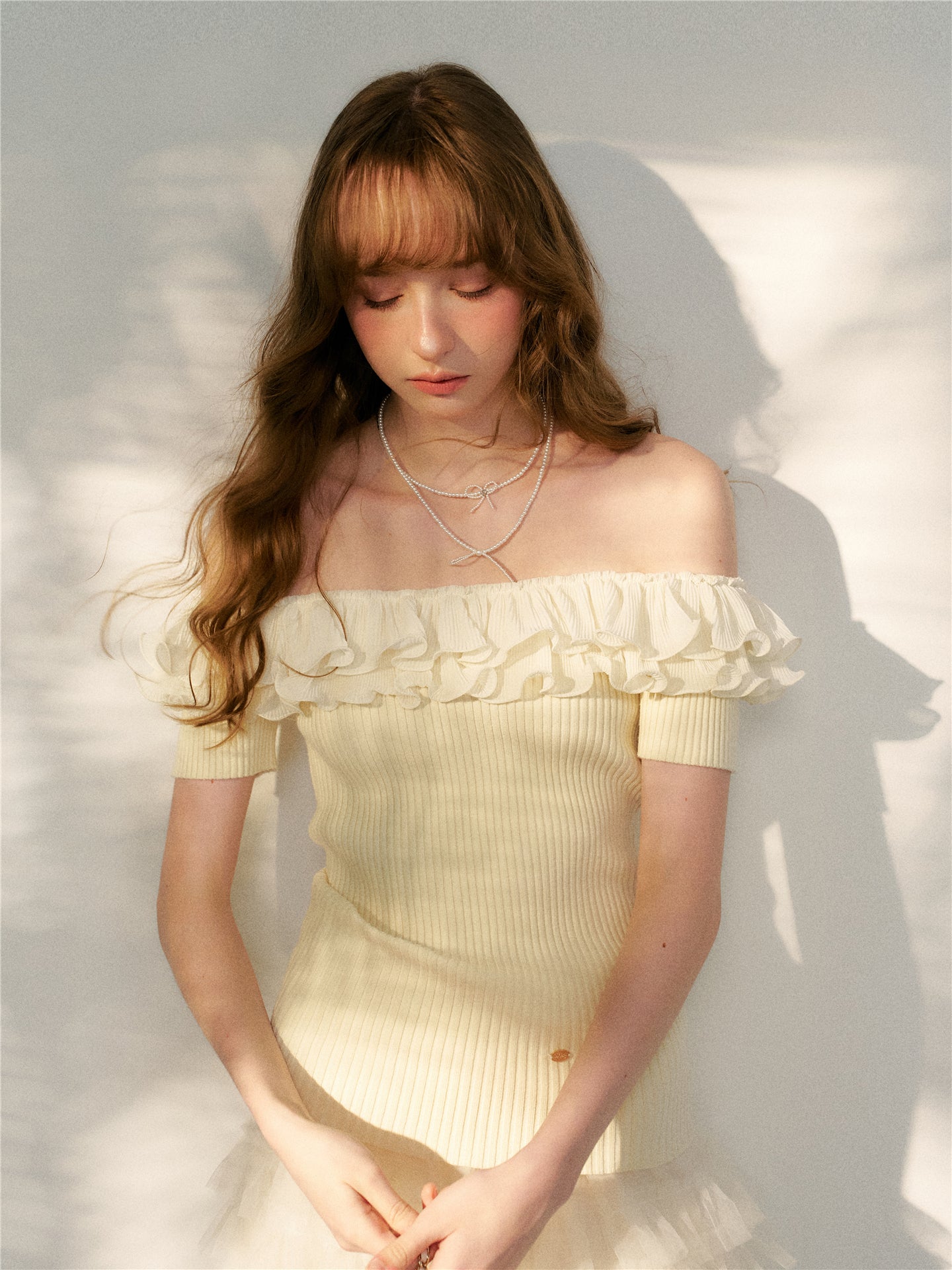 16DEWS 16D26115 Wrinkled ruffle edge knitted top