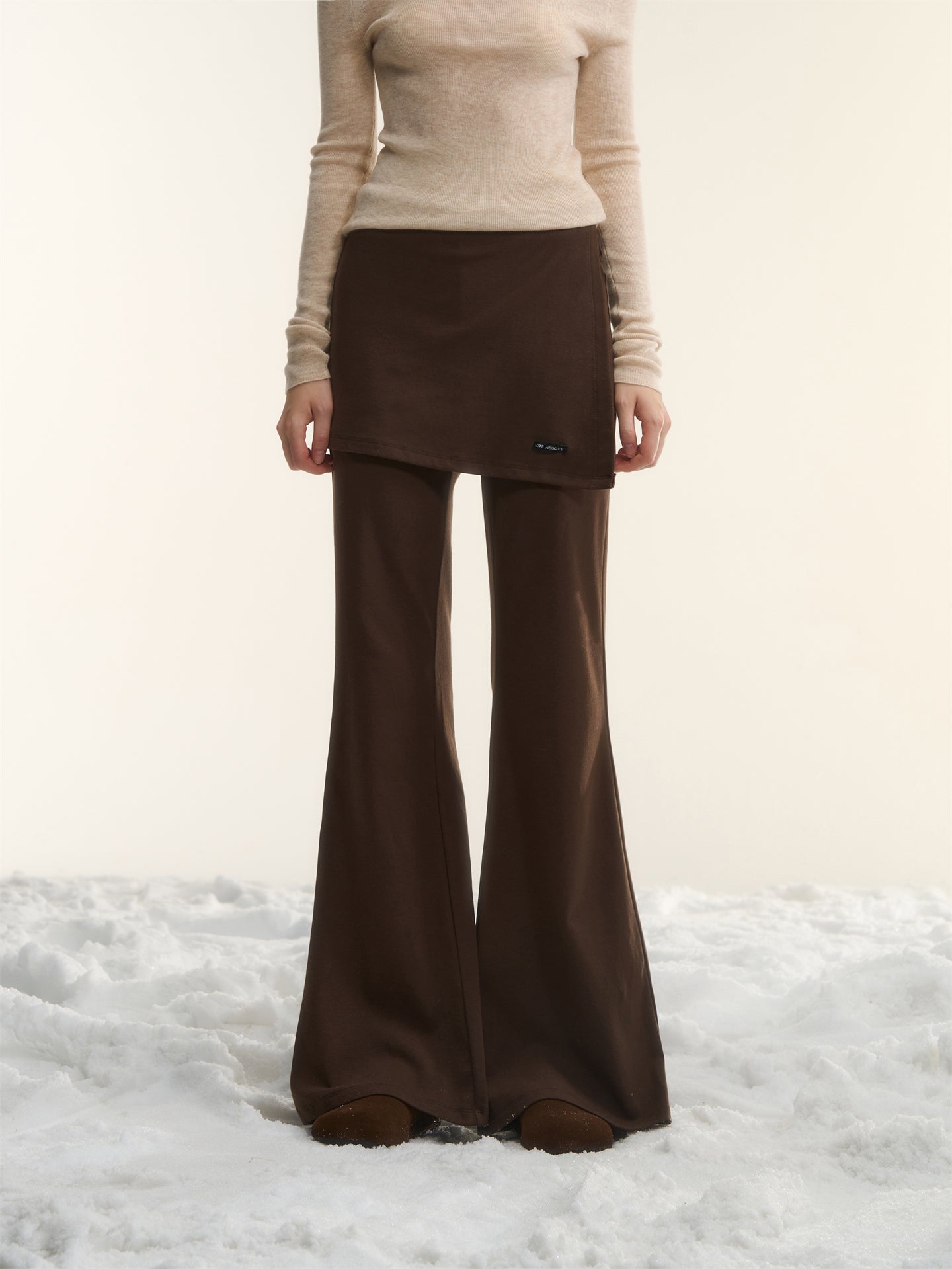 AsGony ASG25562 Irregular fake two pieces of micro flared knitted pants