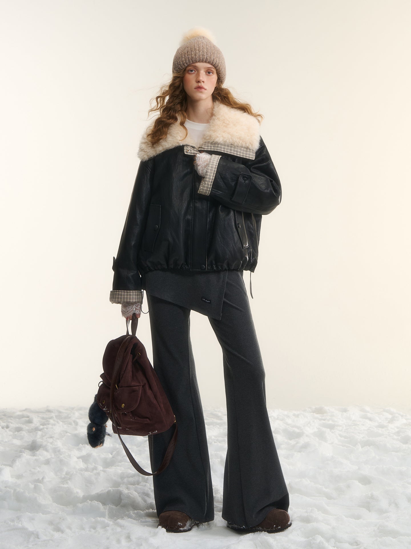 AsGony ASG25562 Irregular fake two pieces of micro flared knitted pants