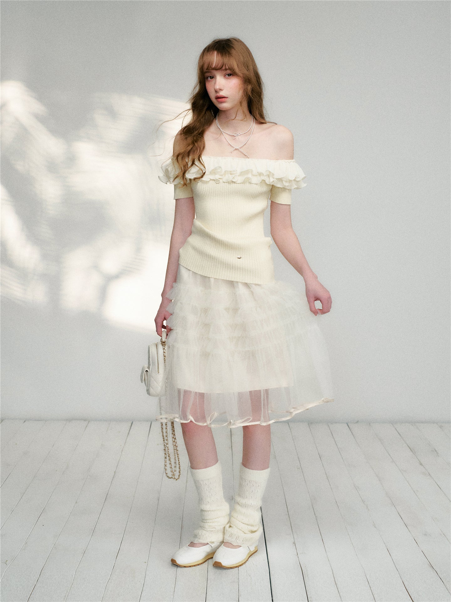 16DEWS 16D26115 Wrinkled ruffle edge knitted top