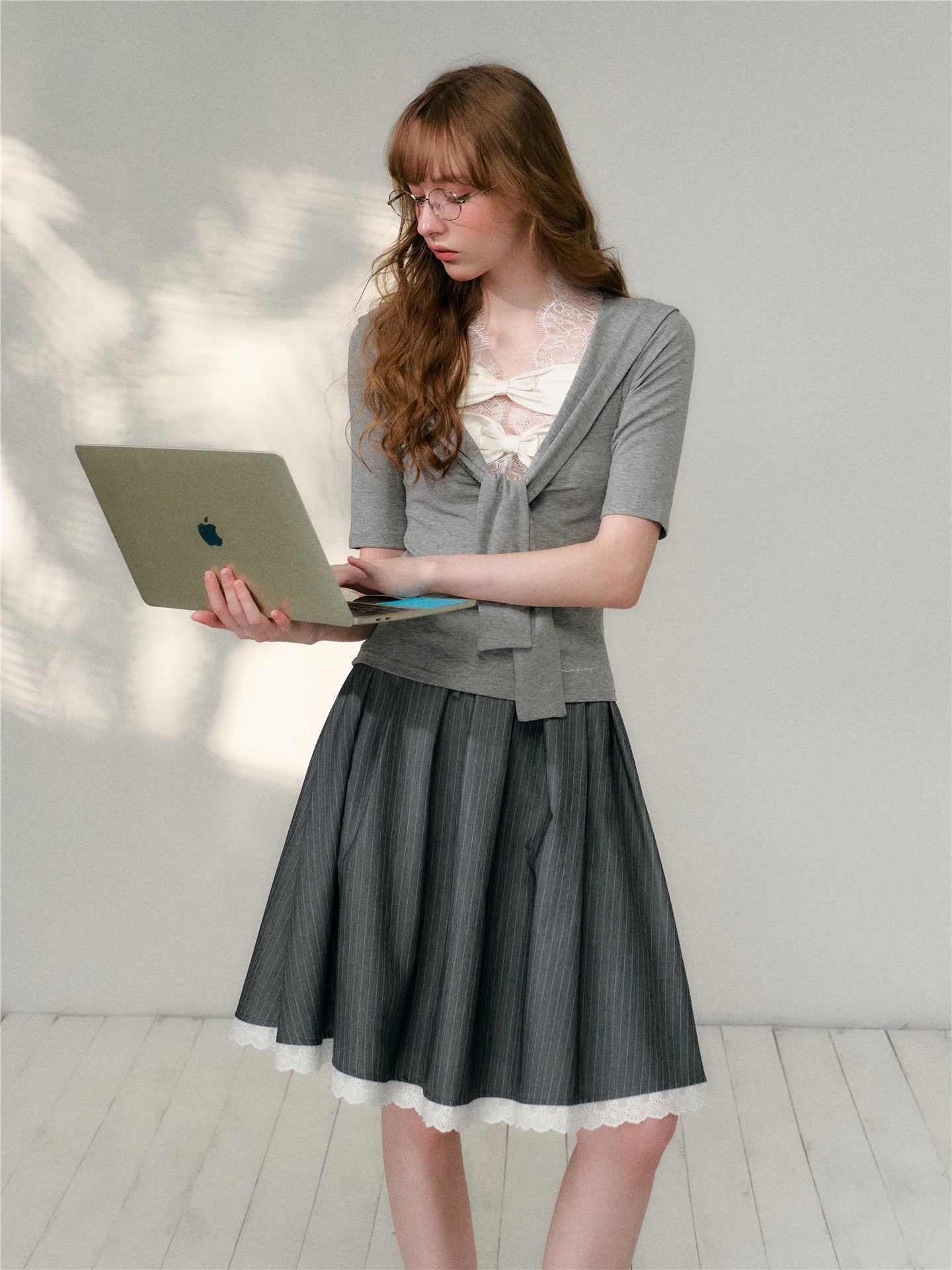 16DEWS 16D26122 Bow stitch mid sleeve top