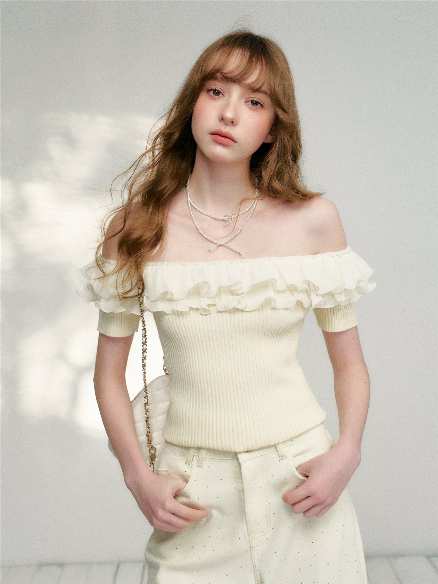 16DEWS 16D26115 Wrinkled ruffle edge knitted top