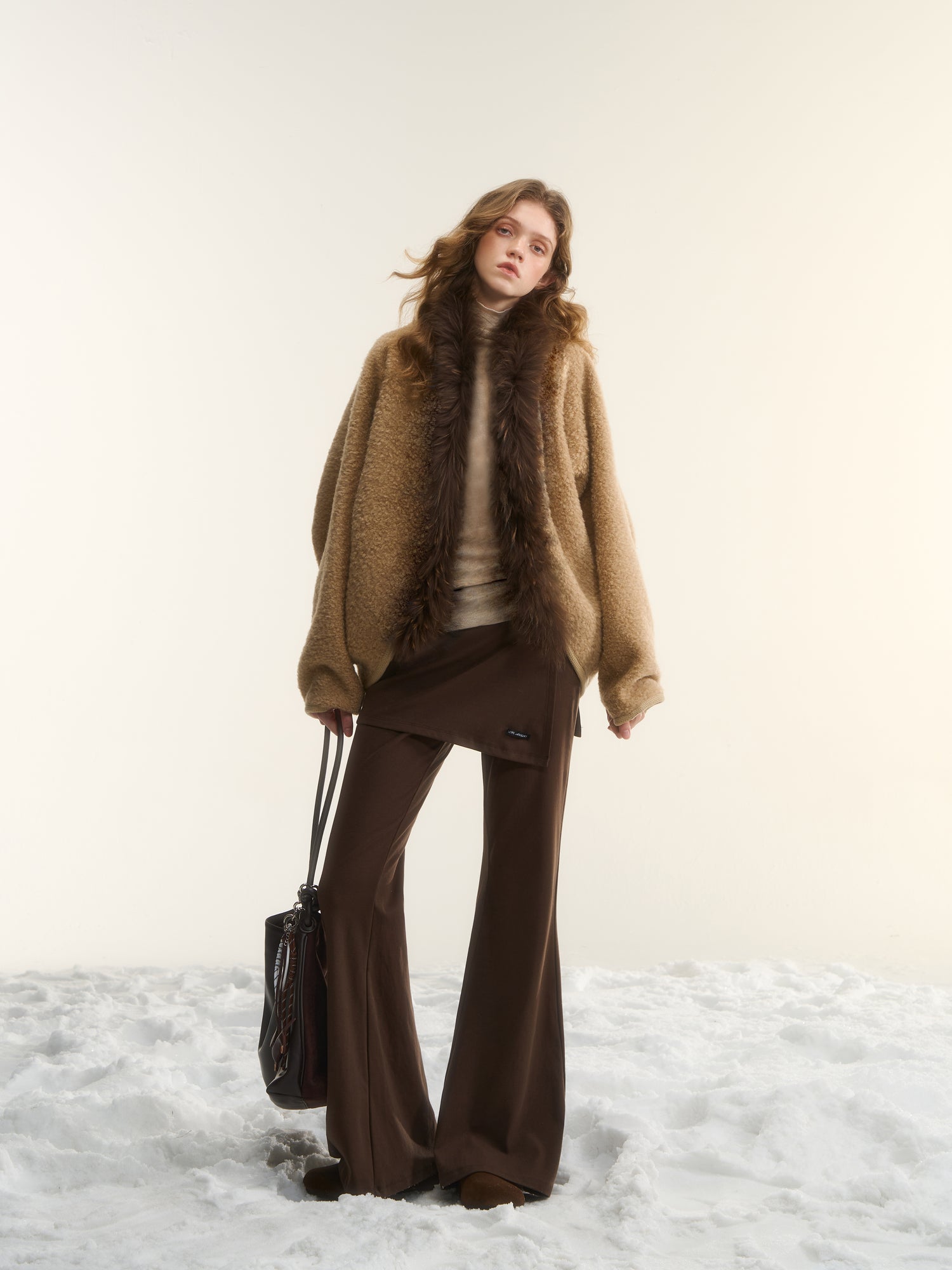 AsGony ASG25562 Irregular fake two pieces of micro flared knitted pants