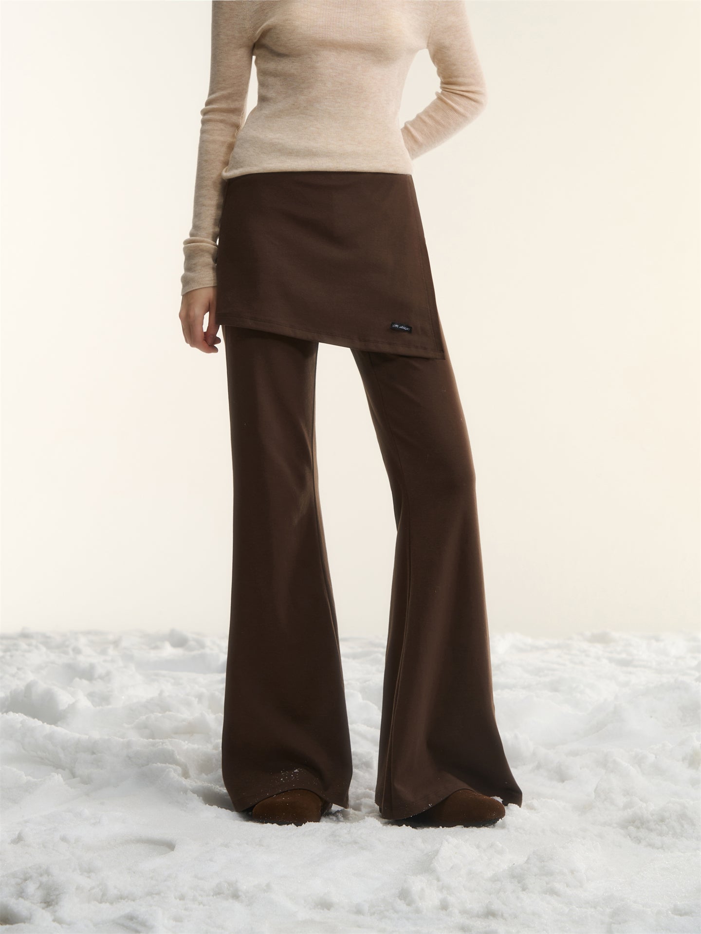 AsGony ASG25562 Irregular fake two pieces of micro flared knitted pants