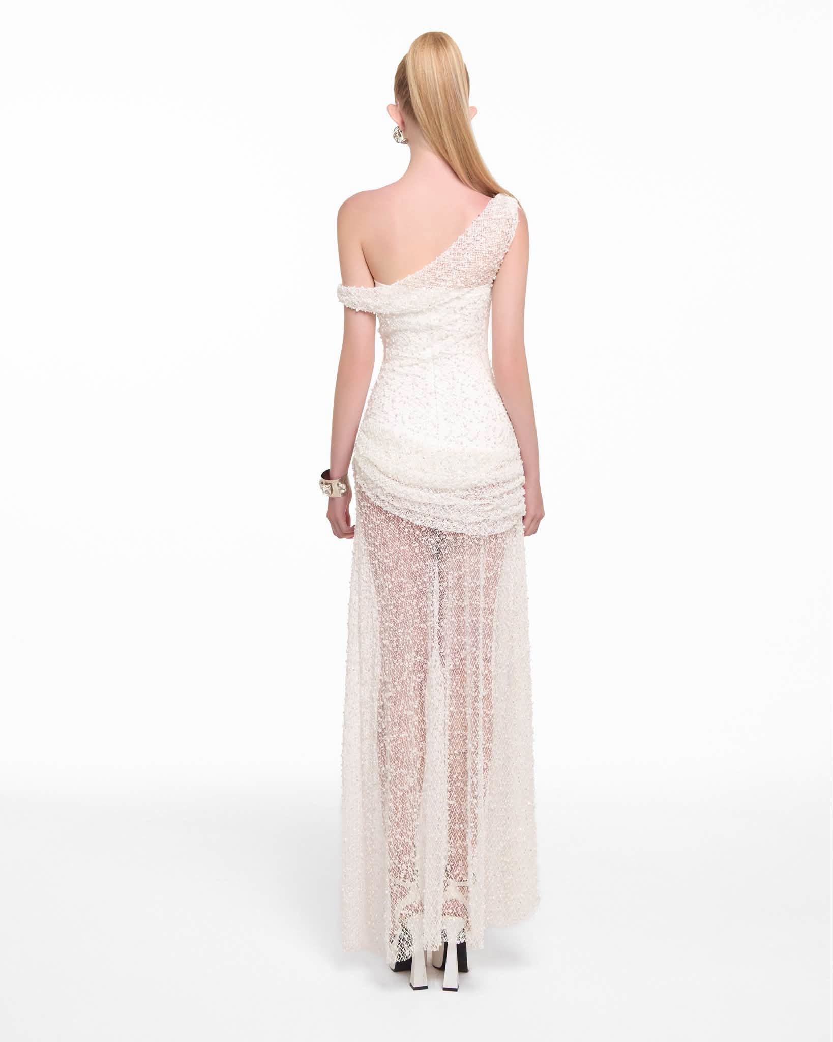 By JENNY ROSALINE DRESS