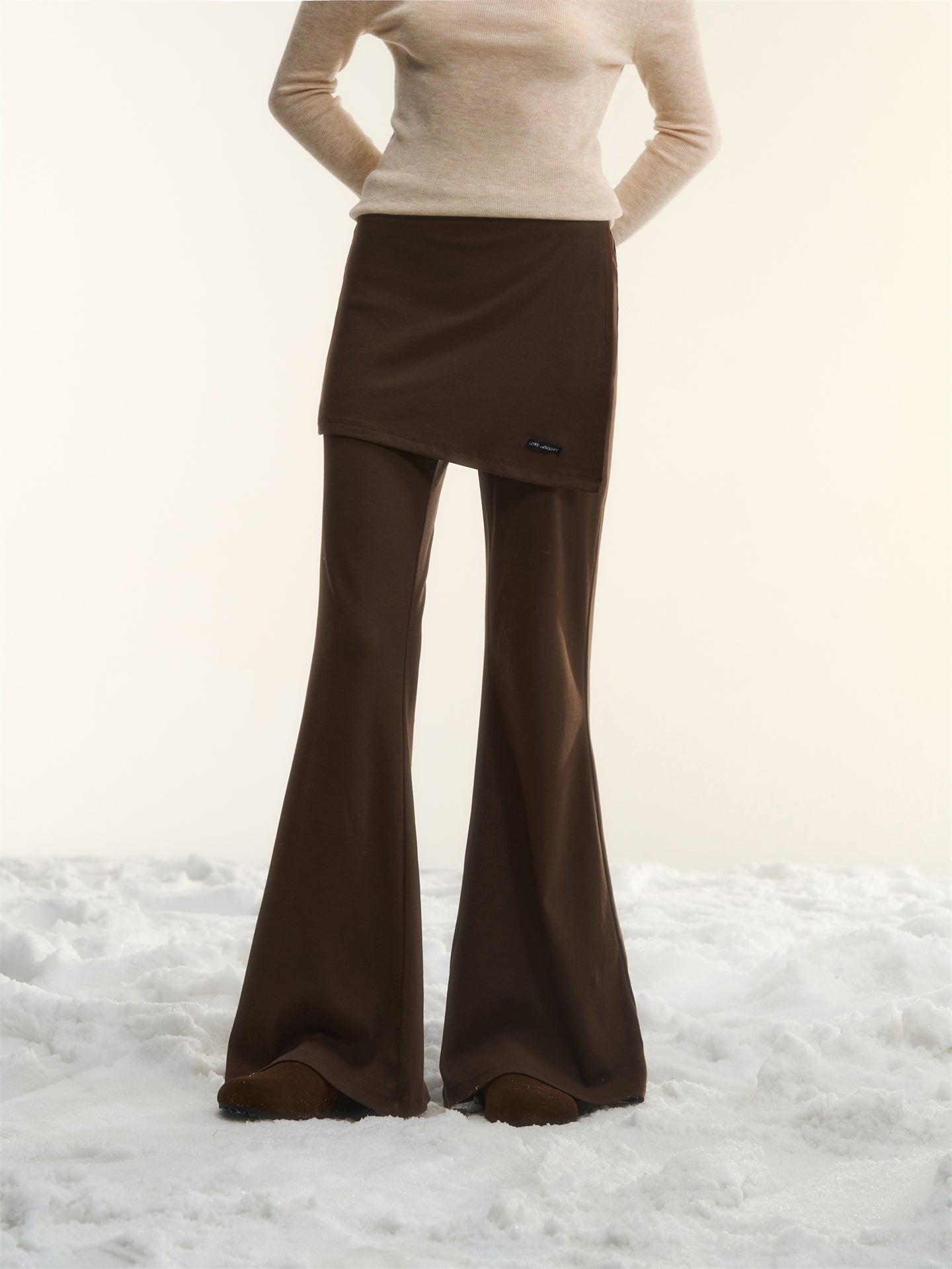 AsGony ASG25562 Irregular fake two pieces of micro flared knitted pants