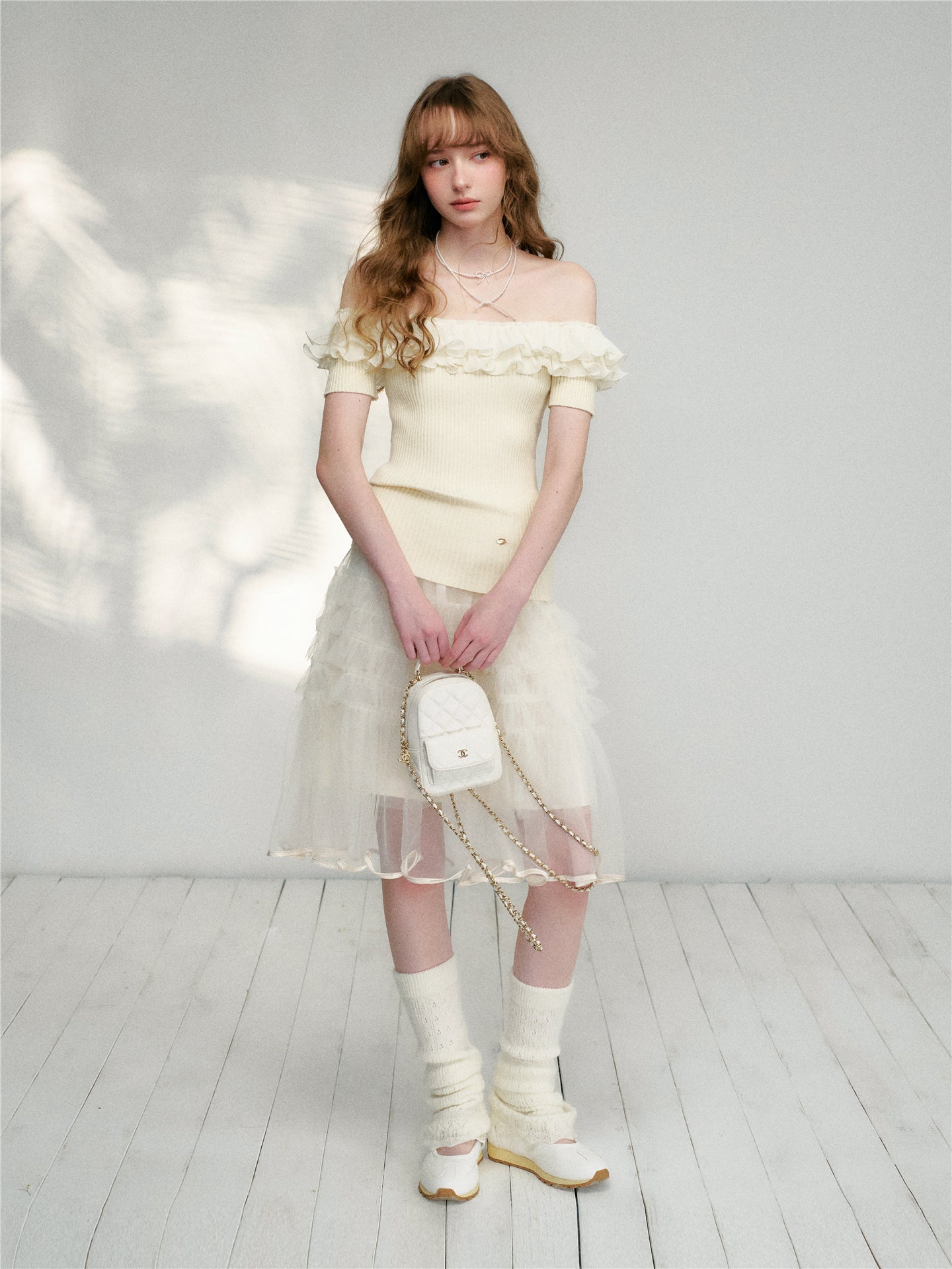 16DEWS 16D26115 Wrinkled ruffle edge knitted top