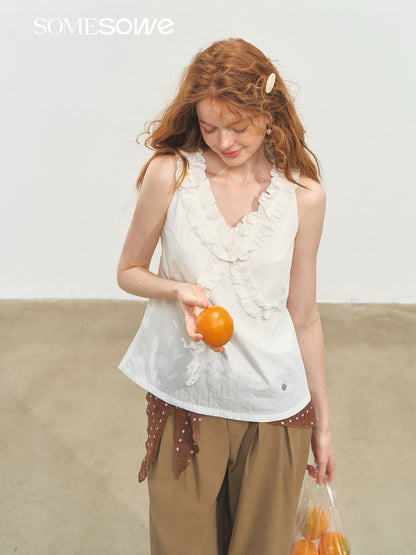 SOMESOWE S2508175 Twisted flower V-neck top