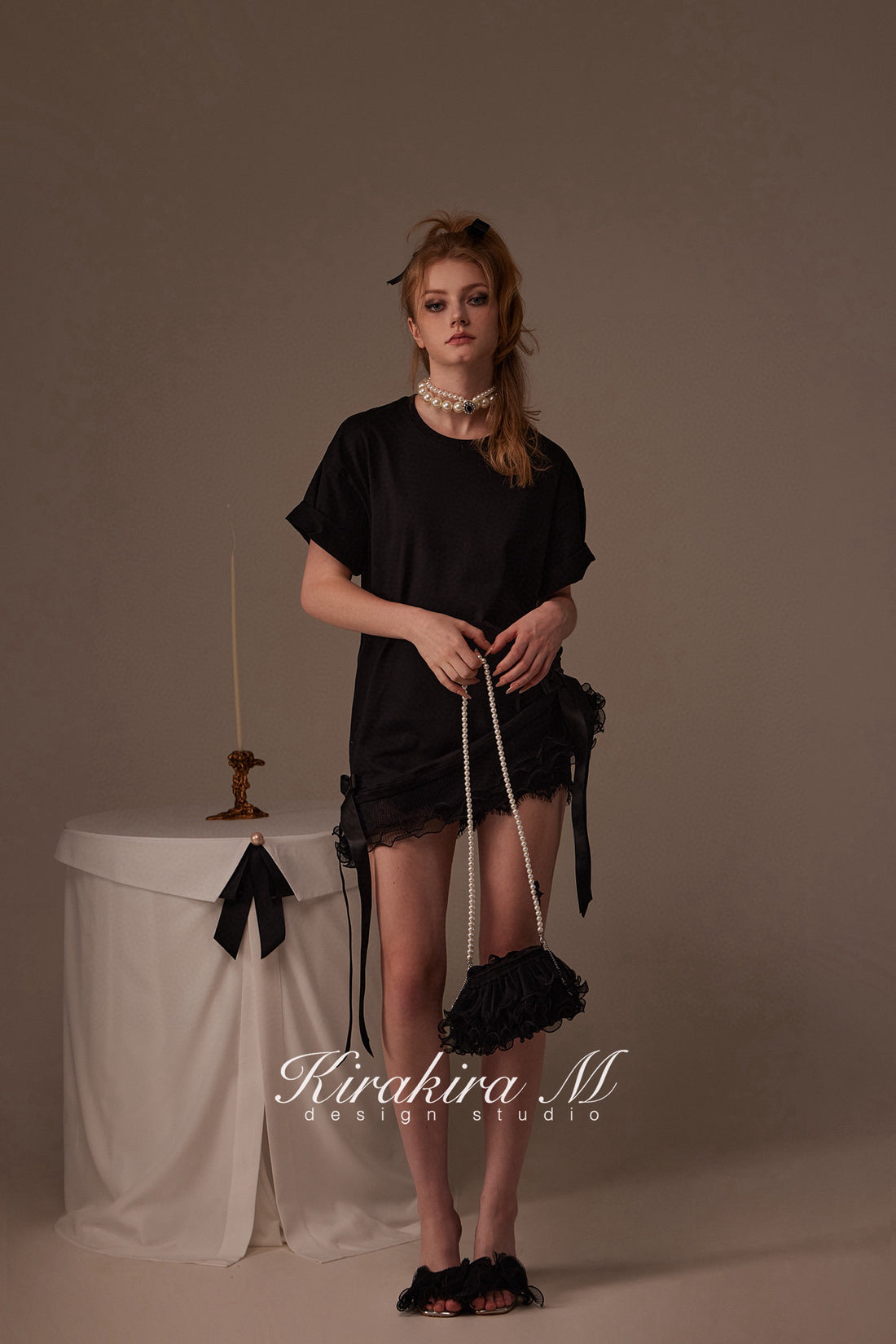 Kirakira.M Black bow loose T-shirt (Multiple ways to wear)