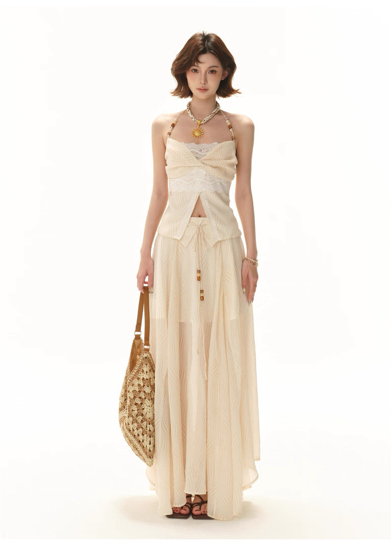 CYNR Beaded strapless top + flowing irregular skirt