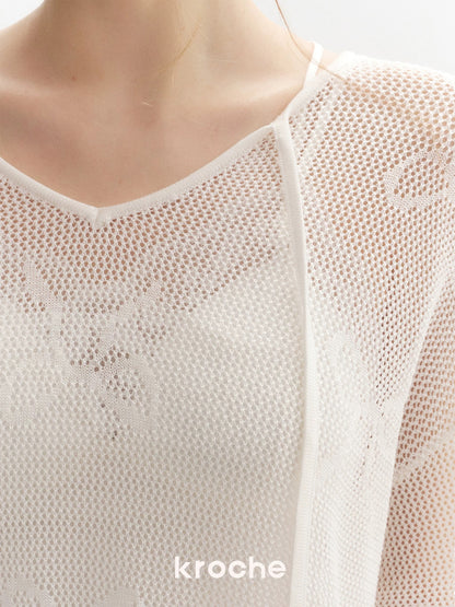 Kroche Loose lace up long sleeved knitted top