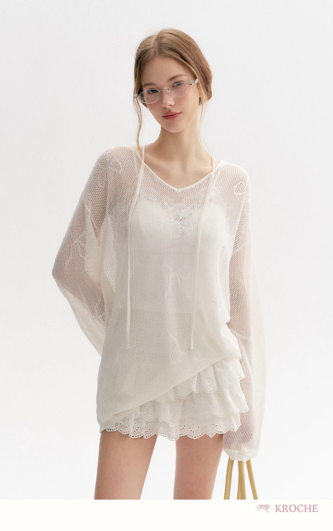 Kroche Loose lace up long sleeved knitted top