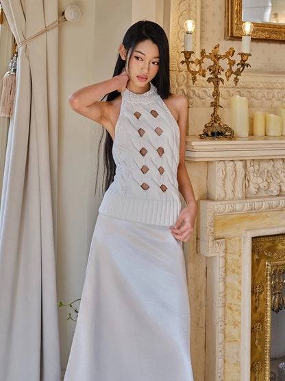 FIND YA WINGS Waist-cinching halter neck hollow knitted top