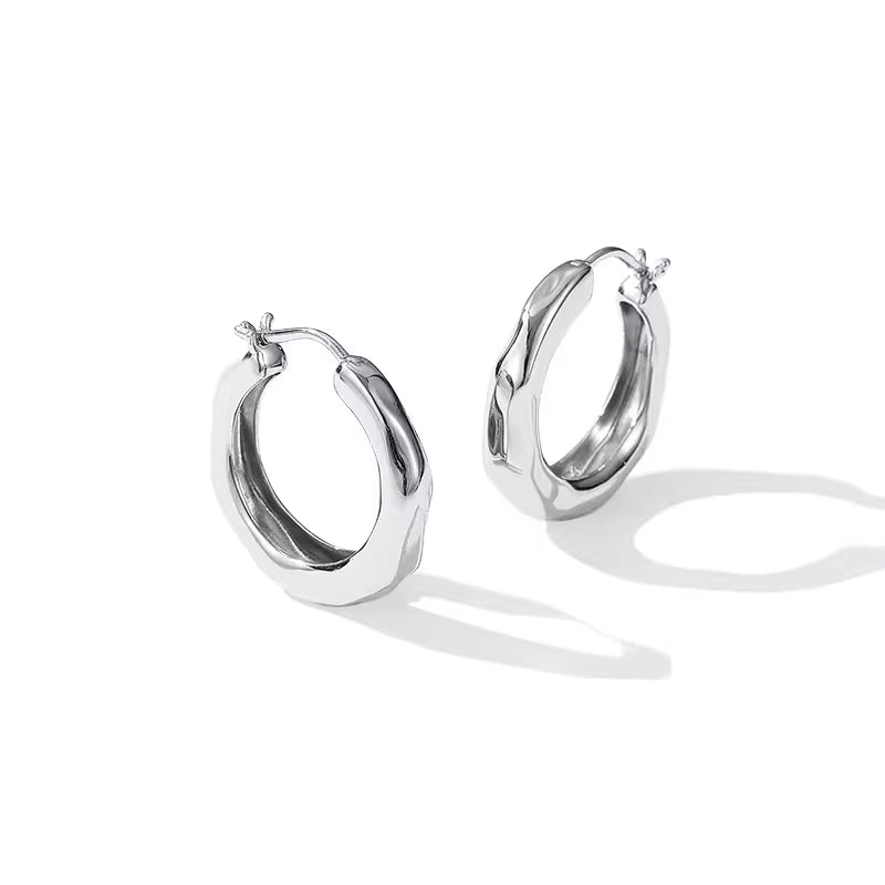 ARSIS Stream golden circle earrings
