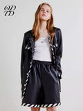 ODTD Black and white striped woven leather jacket