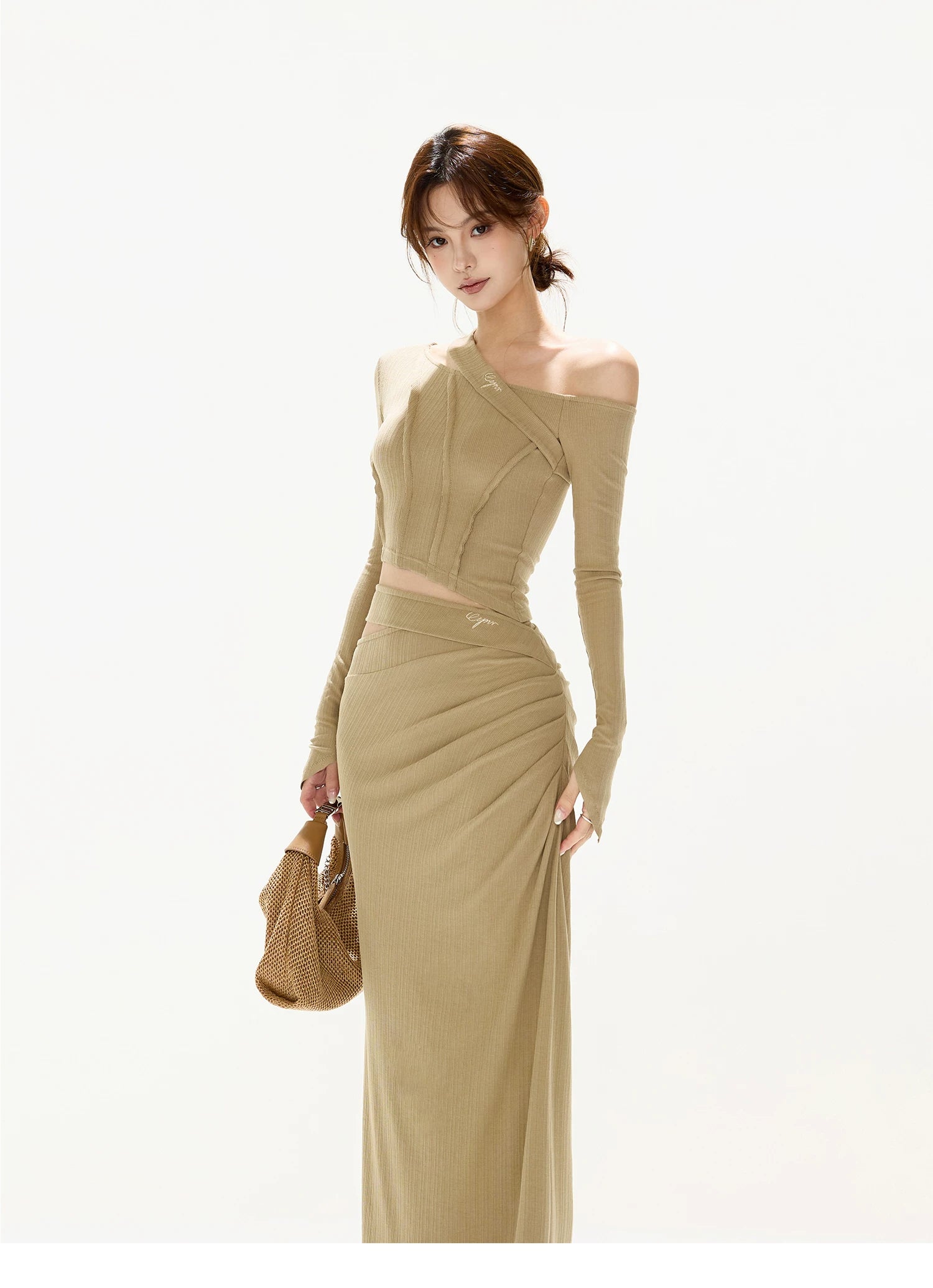 CYNR Slanted shoulder slim fit top + hollowed out long skirt