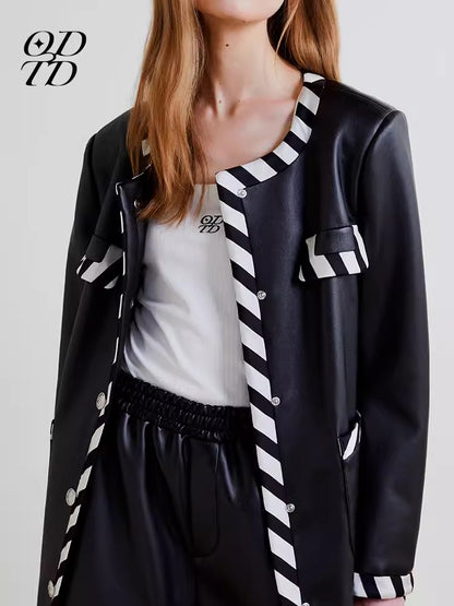 ODTD Black and white striped woven leather jacket